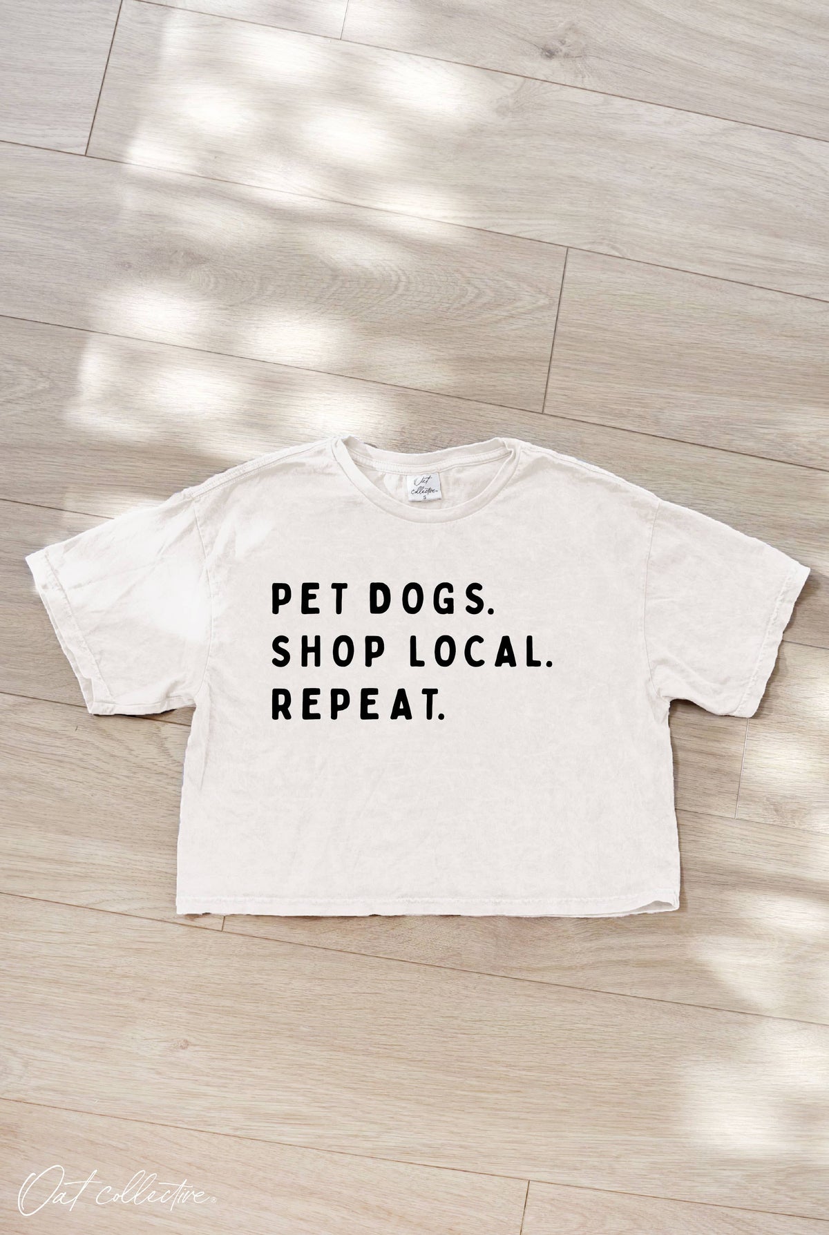 PET DOGS. SHOP LOCAL. REPEAT. Cropped Mineral Graphic Top